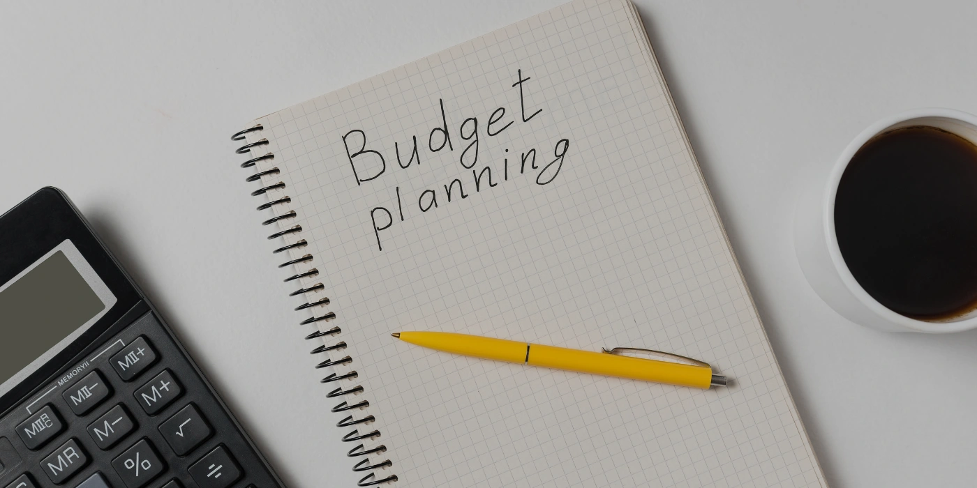 notepad use for budget planning- kundasang on a budget