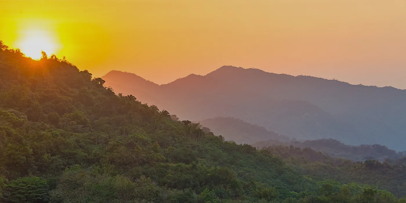 Golden sunrise over the mountains, viewed from Maragang Hill Kundasang Peak