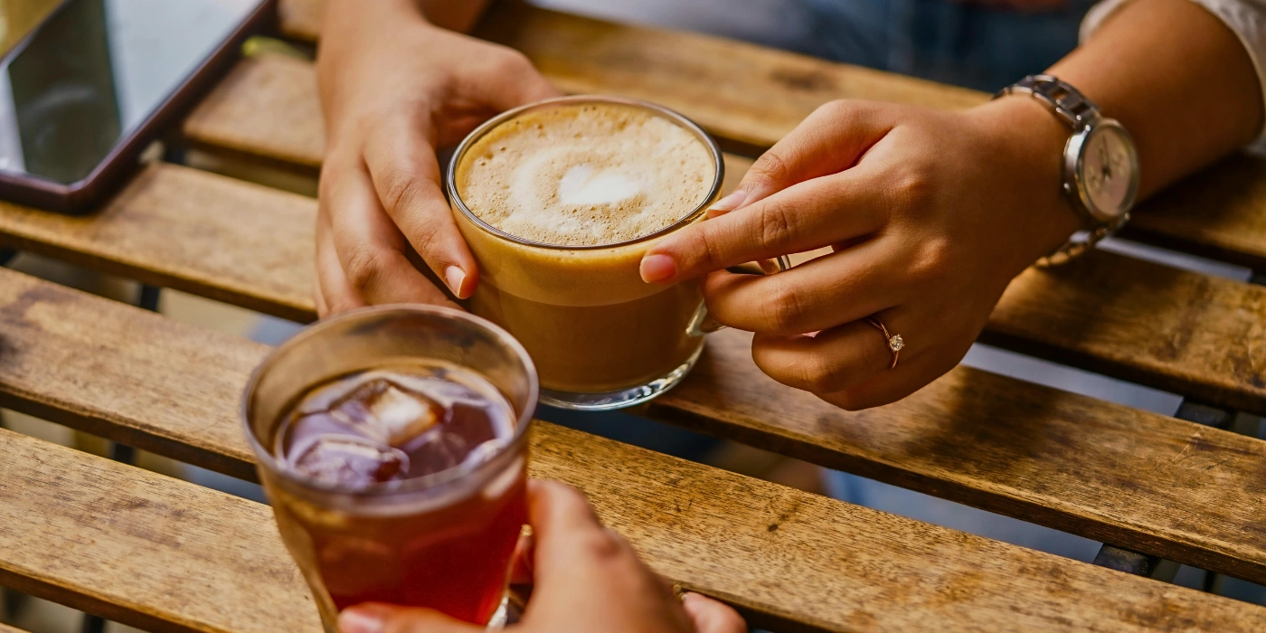2 friends enjoying coffee at one of the best cafes in kundasang