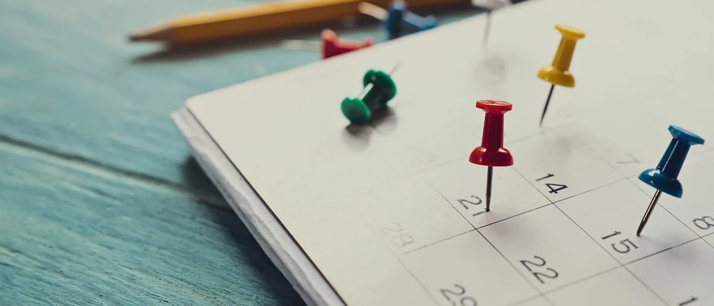 Calendar with bullet pins used to mark the best time to visit Kinabalu park