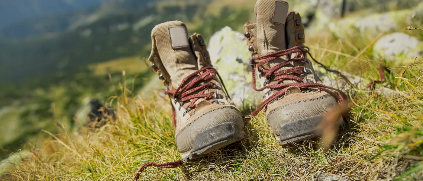 Sturdy hiking shoes on a forest trail