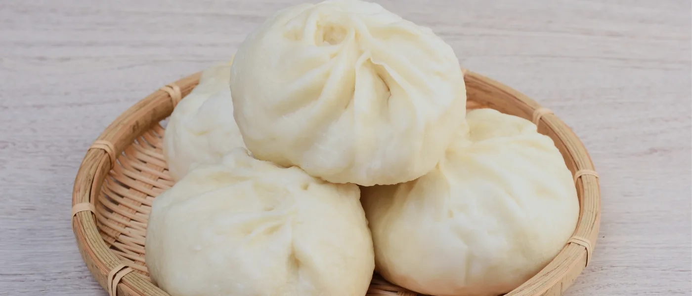 Freshly steamed pau buns filled with sweet or savory fillings