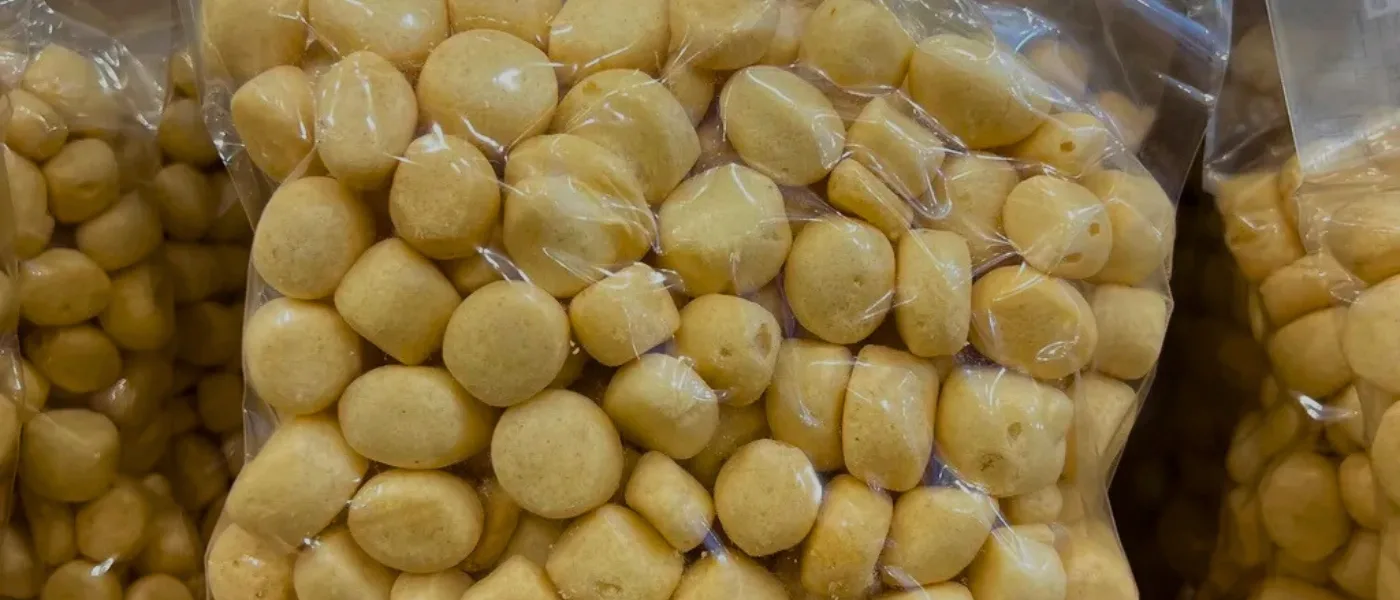 Close-up of amplang, a traditional Sabah fish cracker snack made from fish paste and tapioca flour