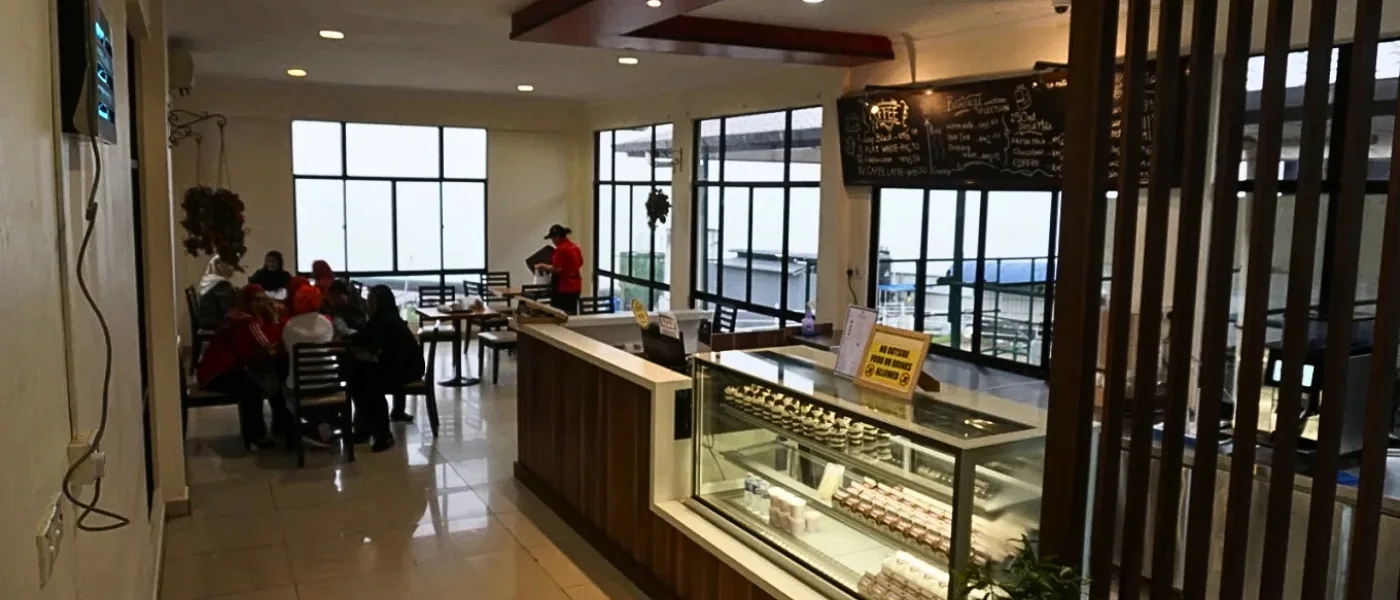 The in-house café at Desa Dairy Farm offers light meals, snacks, and fresh dairy treats with views of Mount Kinabalu. (Photo by: Konstantin Ozerov)