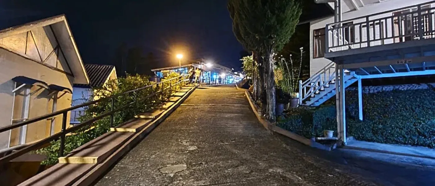 Open walkway between chalets at Kinabalu Pine Resort