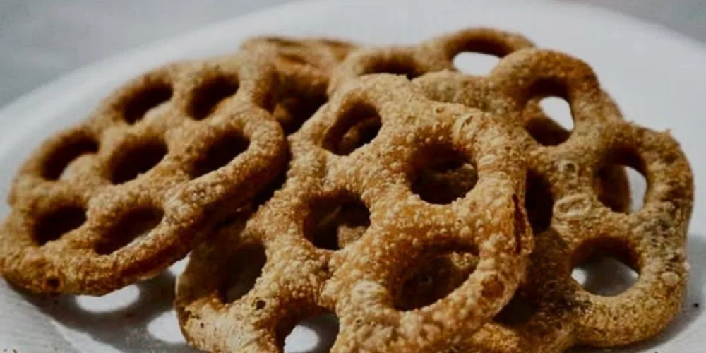 Close-up of kuih cincin, a traditional Malaysian ring-shaped snack made from rice flour and palm sugar