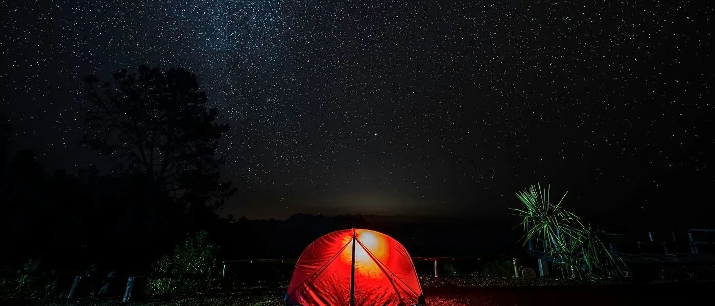 Starry night sky above Maragang Hill campsite in Kundasang.