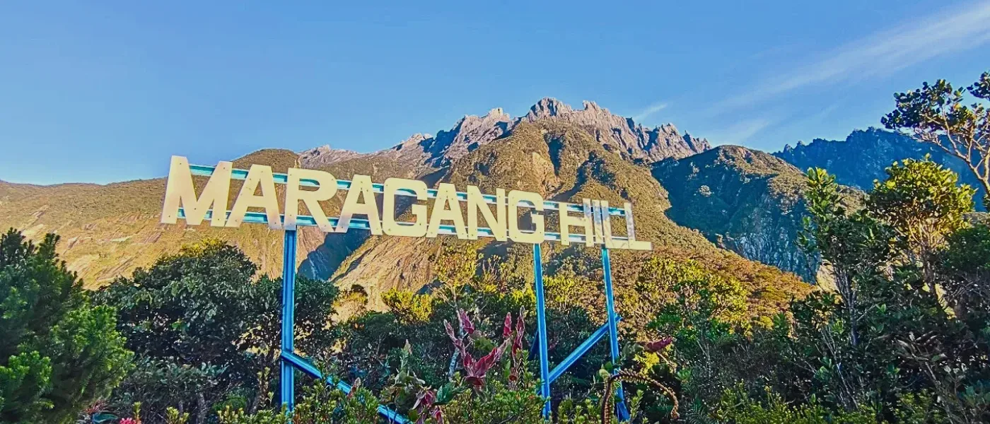 Maragang Hill Signboard with Mountain Backdrop
