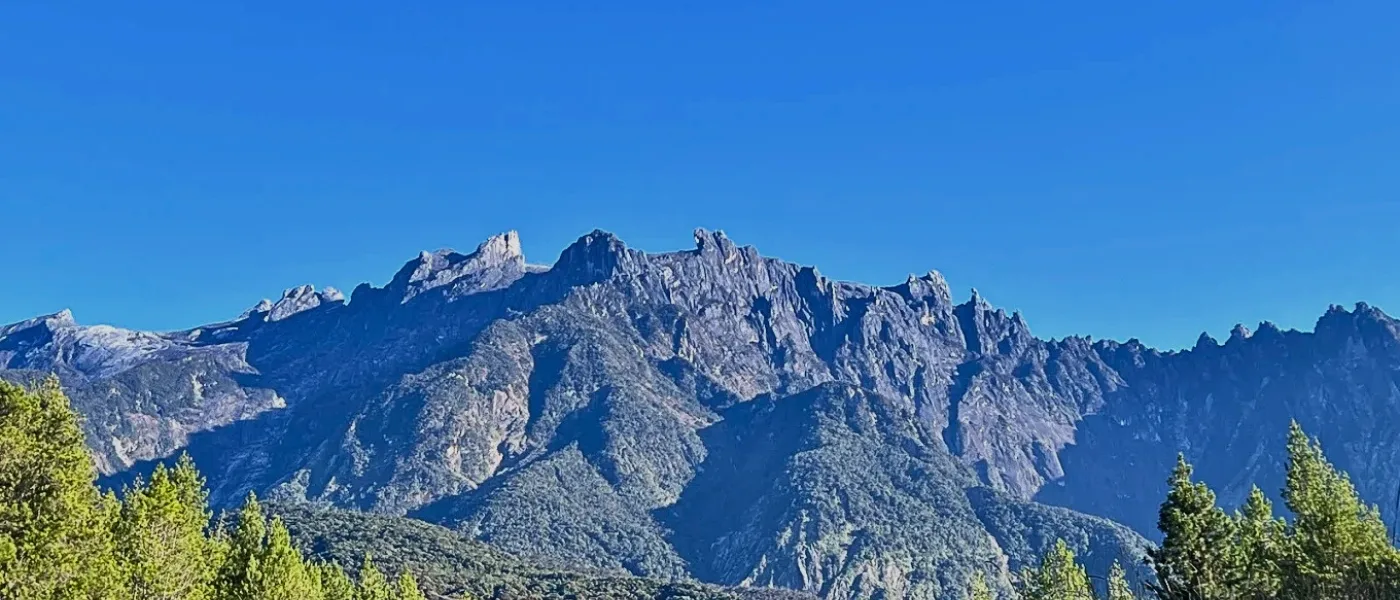 The best time to visit Sosodikon Hill for clear views of Mount Kinabalu is from February to April, especially in the early morning before clouds sweep in. (Photo by: PF Wern)