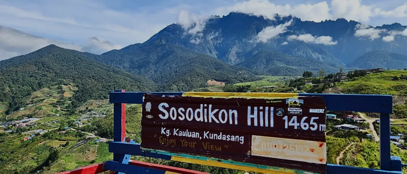 View of Mount Kinabalu from the peak of Sosodikon Hill in Kundasang.